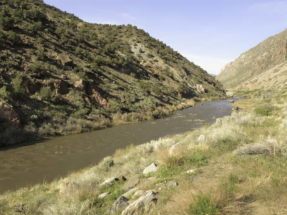 Rio Grande flowing across desert south of Taos, New Mexico